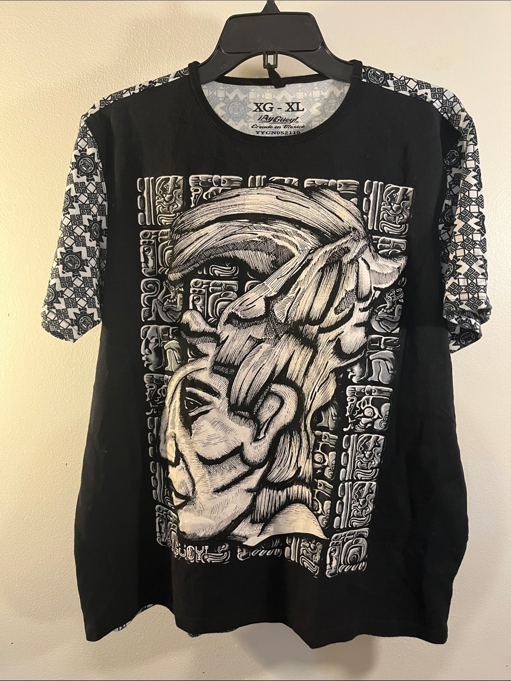 XG-XL Black Short-Sleeve Graphic Tee with White Tribal Portrait